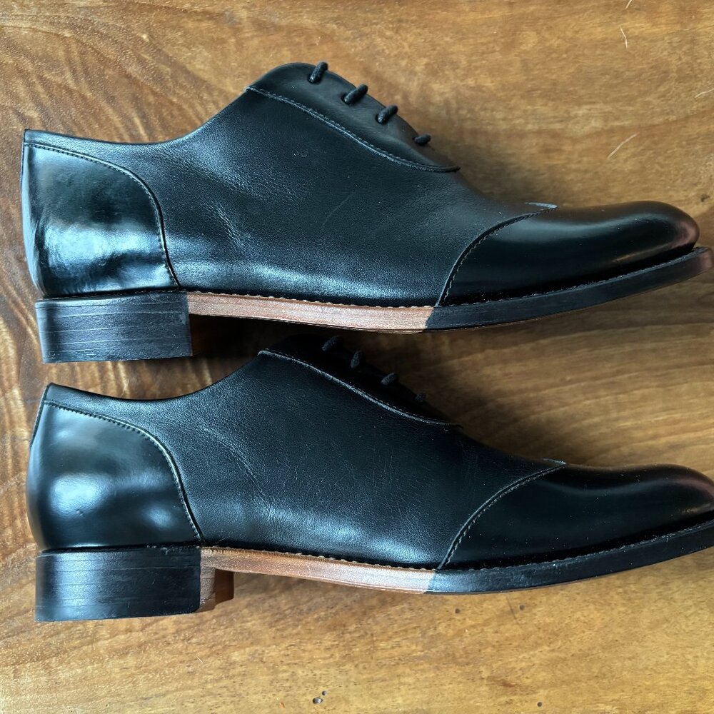 The Office of Angela Scott Mr. Evans Black Leather Wingtip Oxfords 37